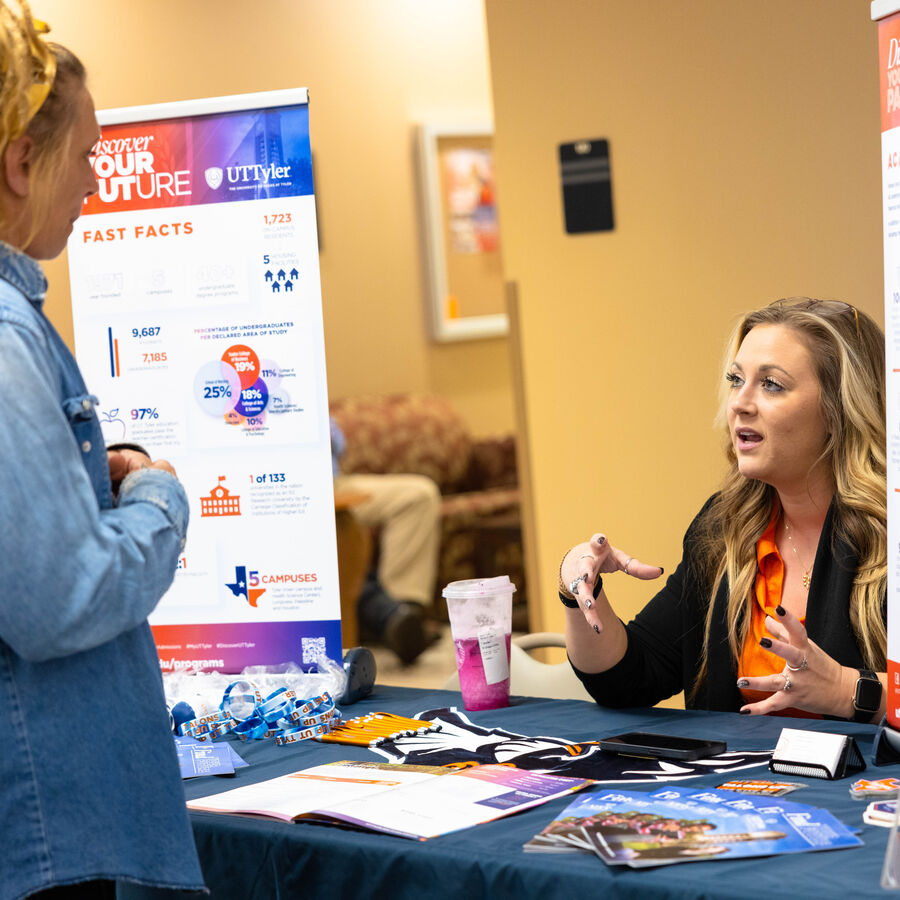 A prospective student learn more about UT Tyler's academic programs during a transfer open house at Longview University Center