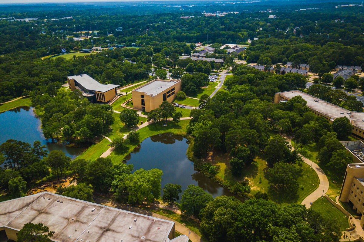 An aerial photo of the campus, the HPC, Library and Pharmacy are in view