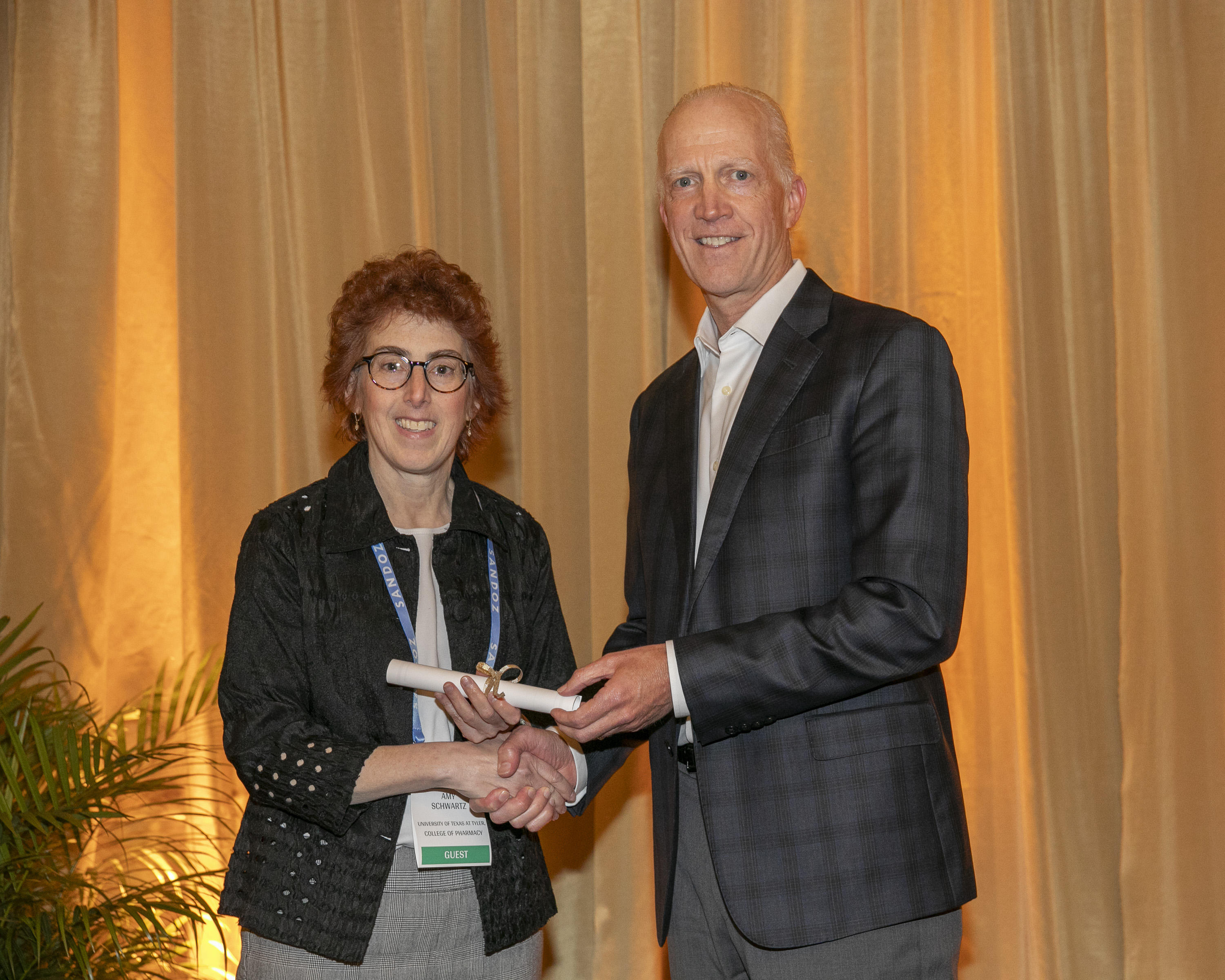 Martin Otto Awarding Dean Amy Schwartz