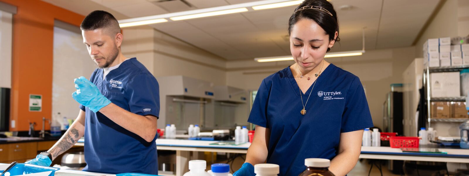 pharmacy students working at the compounding lab