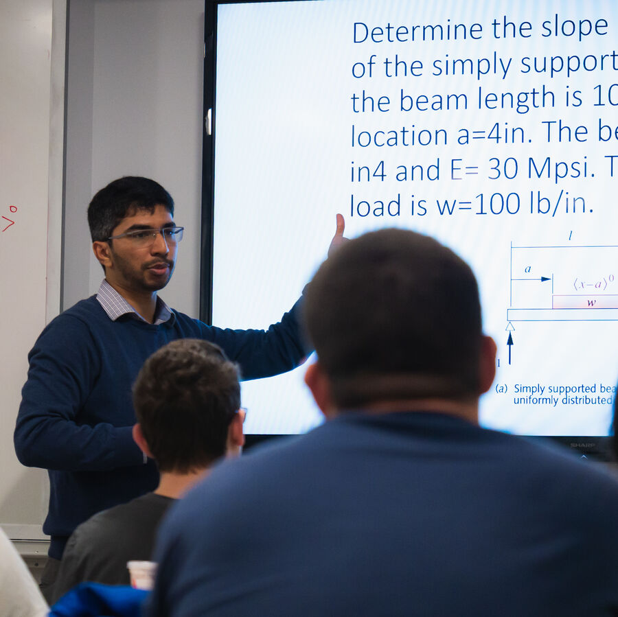 A lecturer presents in class at UT Tyler's Houston Engineering Center.