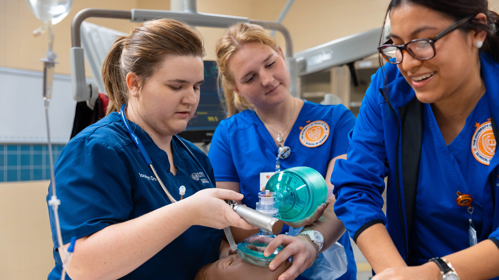 Students practice treating patients at SMILE (simulation lab on north campus) during a collaborative event between UT Tyler's School of Medicine, School of Nursing and Fisch College of Pharmacy.