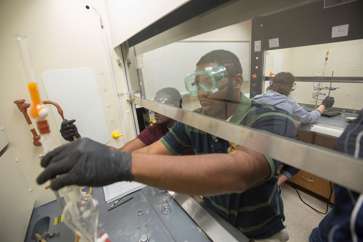 Male UT Tyler student working inside a lab