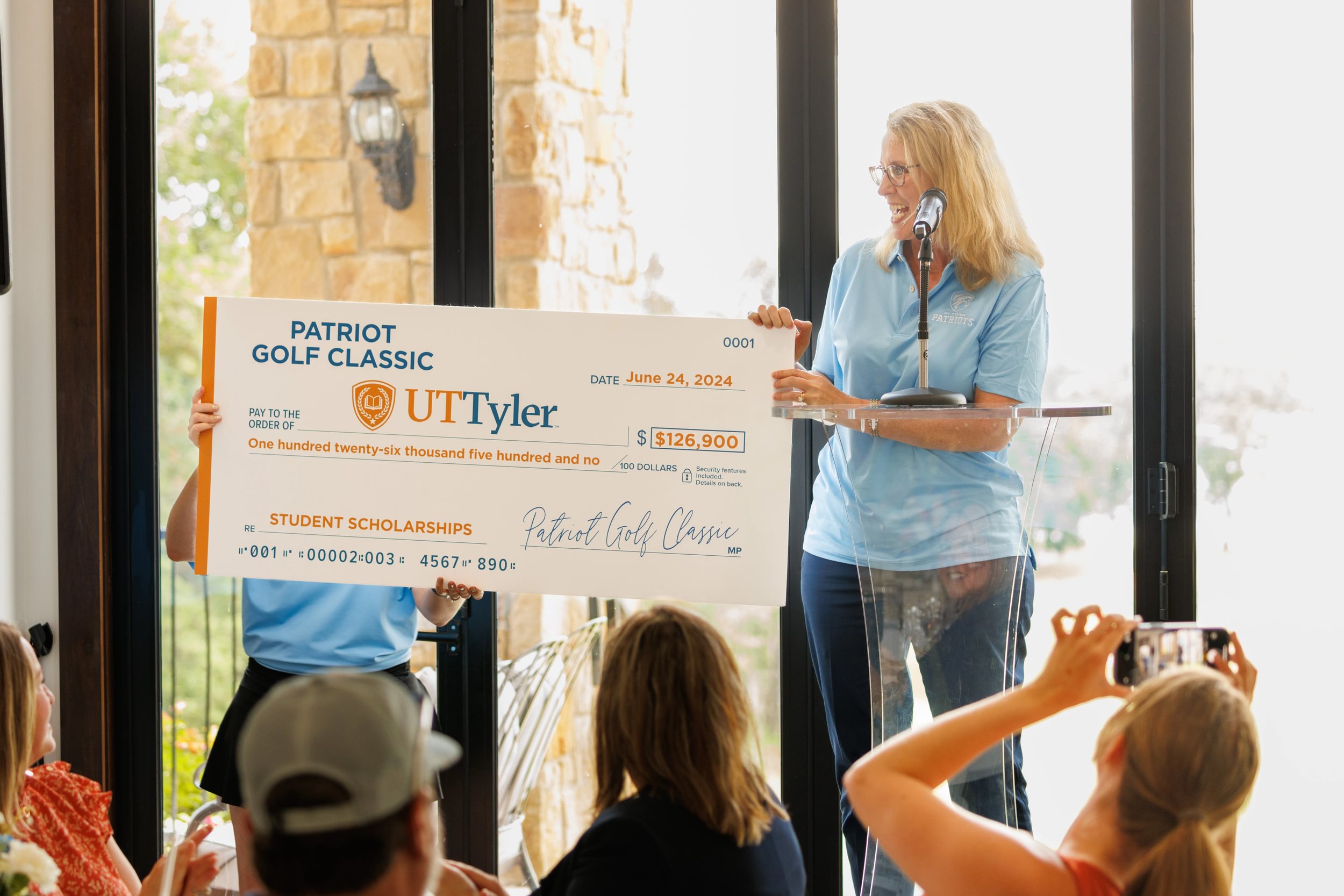 UT Tyler recieving donation