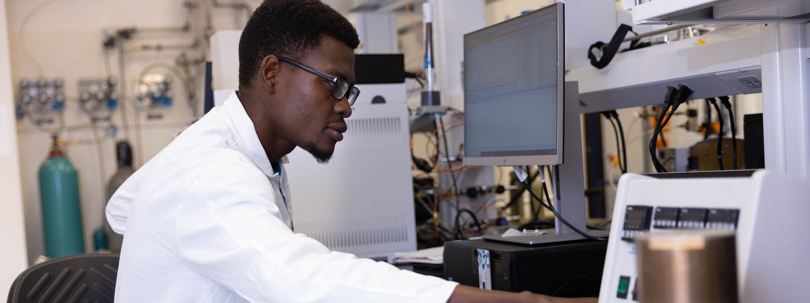 A chemical engineering student working in the lab