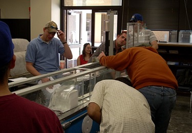 Students using a flume in the Hydrology/Environmental Lab