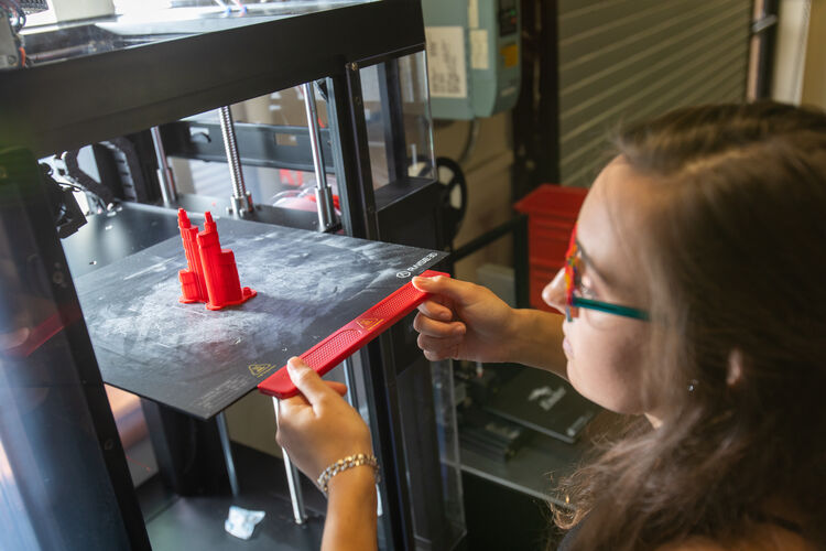 Civil Engineering Student 3D printing a building