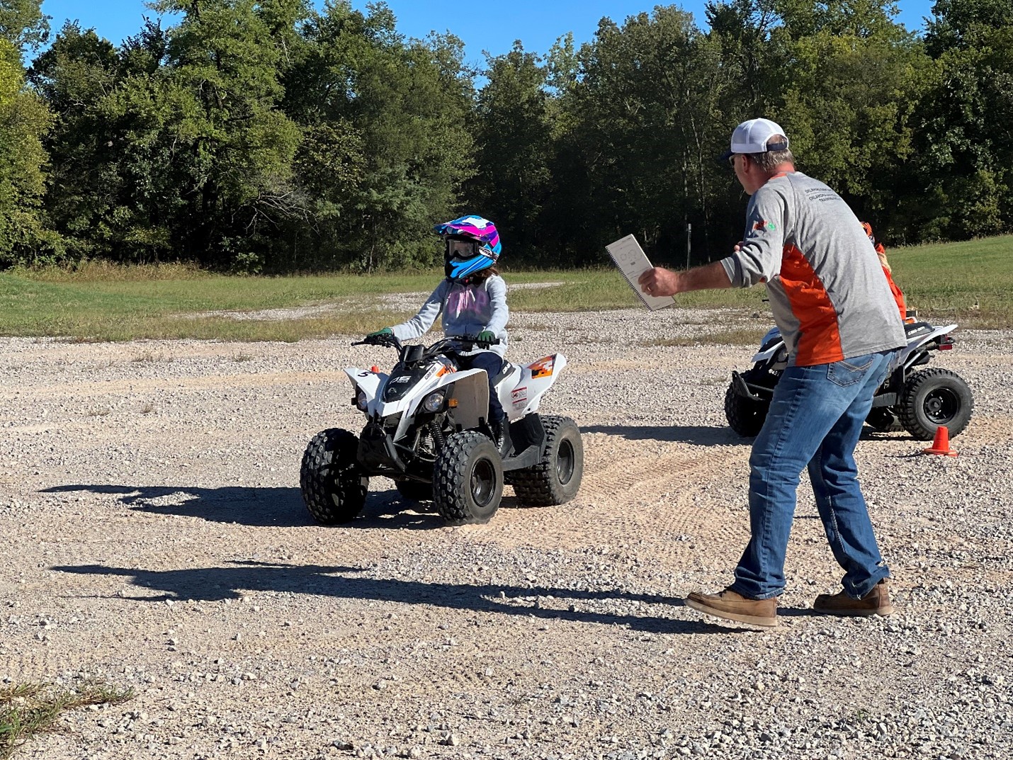 Child riding a four wheeler