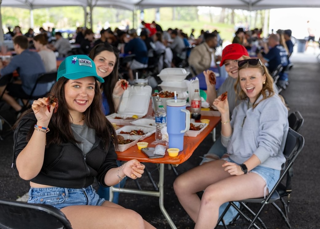 Students enjoying their time at the annual crawfish boil