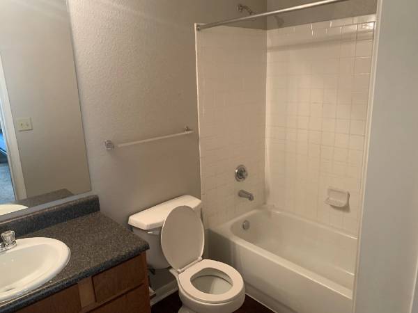 Bathroom showing toilet and shower